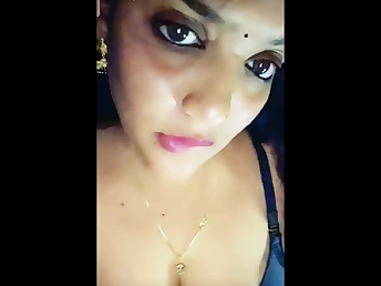 Watch this sizzling Telugu stunner dance sensuously with her boobs displaying and getting her cock-squeezing cooch poked rock-hard